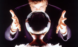 man staring into a crystal ball crystal