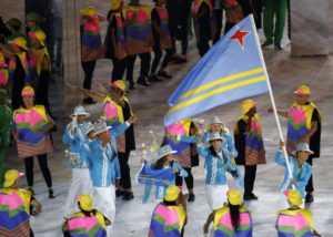 epa05457153 Nicole van der Velden leads the Aruba delegation enter the field during the Opening Ceremony of the Rio 2016 Olympic Games at the Maracana Stadium in Rio de Janeiro, Brazil, 05 August 2016. EPA/TATYANA ZENKOVICH